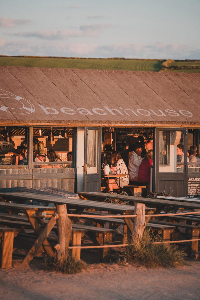 Beach House Devon in the evening sunshine. Rose, seafood and cocktails. 